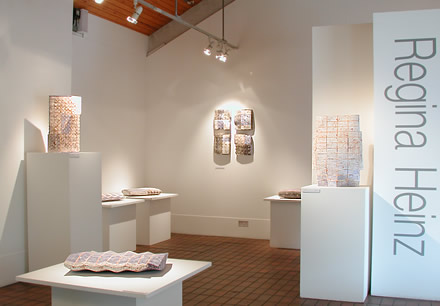 The gallery display: The exhibition comprises free-standing sculptures and ceramic wall pieces